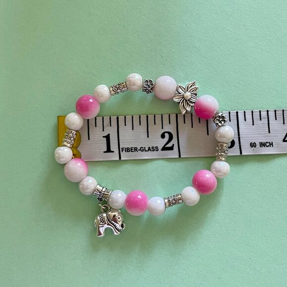 Handmade bracelet with beads and dangling elephant charm - Picture 7 of 7